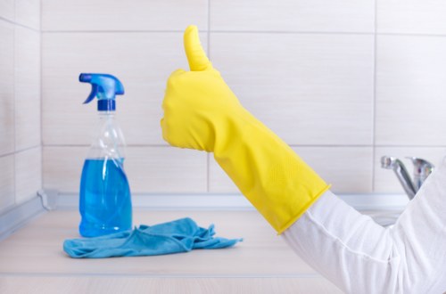 Carpet cleaning team preparing equipment safely before a job
